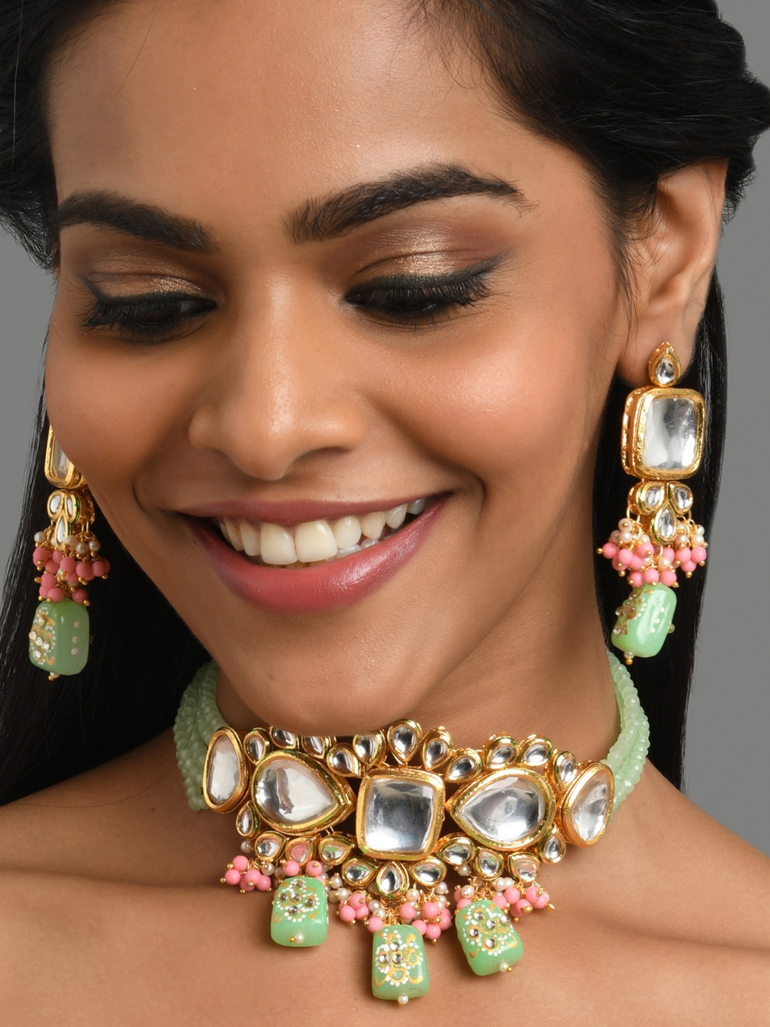 

Fida Gold-Plated White & Green Stone-Studded & Pearl Beaded Choker Jewellery Set