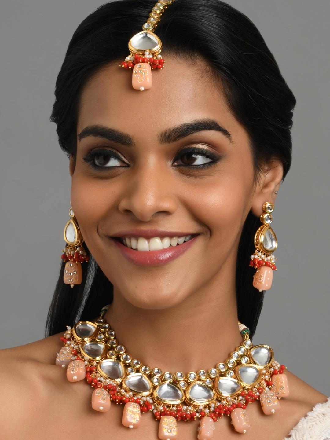

Fida Gold-Plated White & Red Stone-Studded & Pearl Beaded Jewellery Set