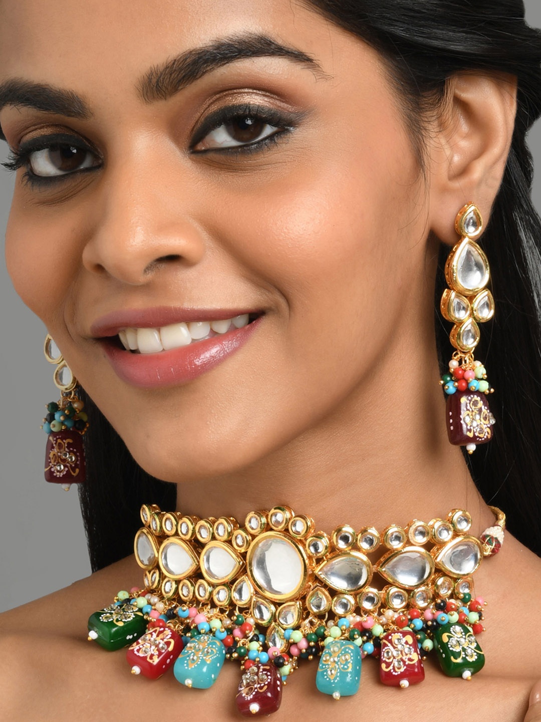 

Fida Women Blue Gold-Plated Ornate Pearl Kundan Jewellery Set