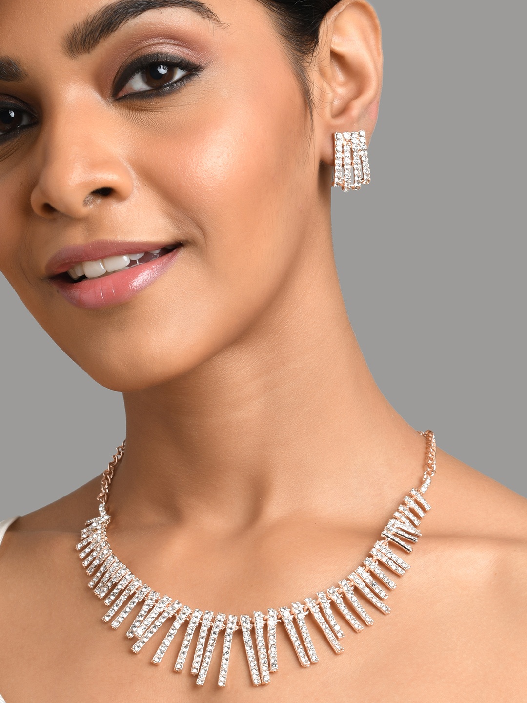 

Fida Gold Plated & White AD-Studded Jewellery Set