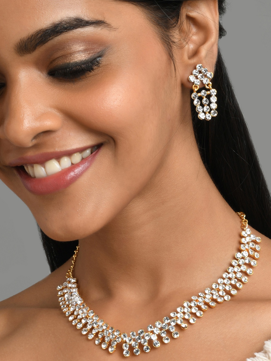 

Fida Gold-Plated White AD-Studded Jewellery Set