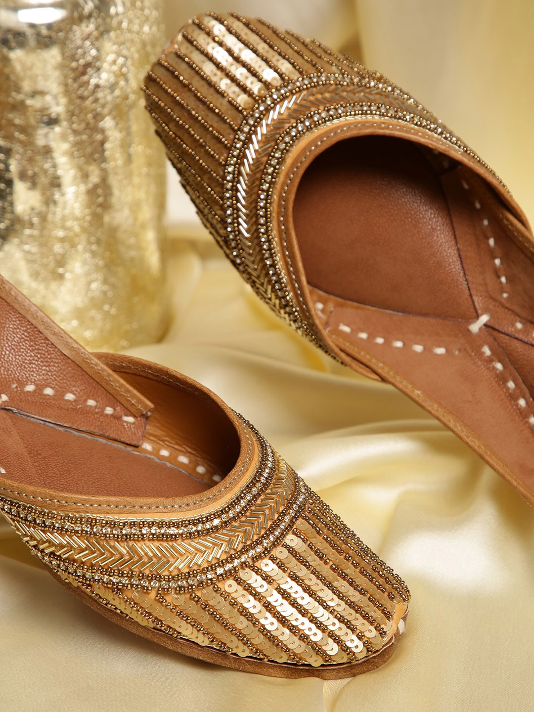 

GLAM STORY Women Gold-Toned Leather Embellished Mojaris Flats