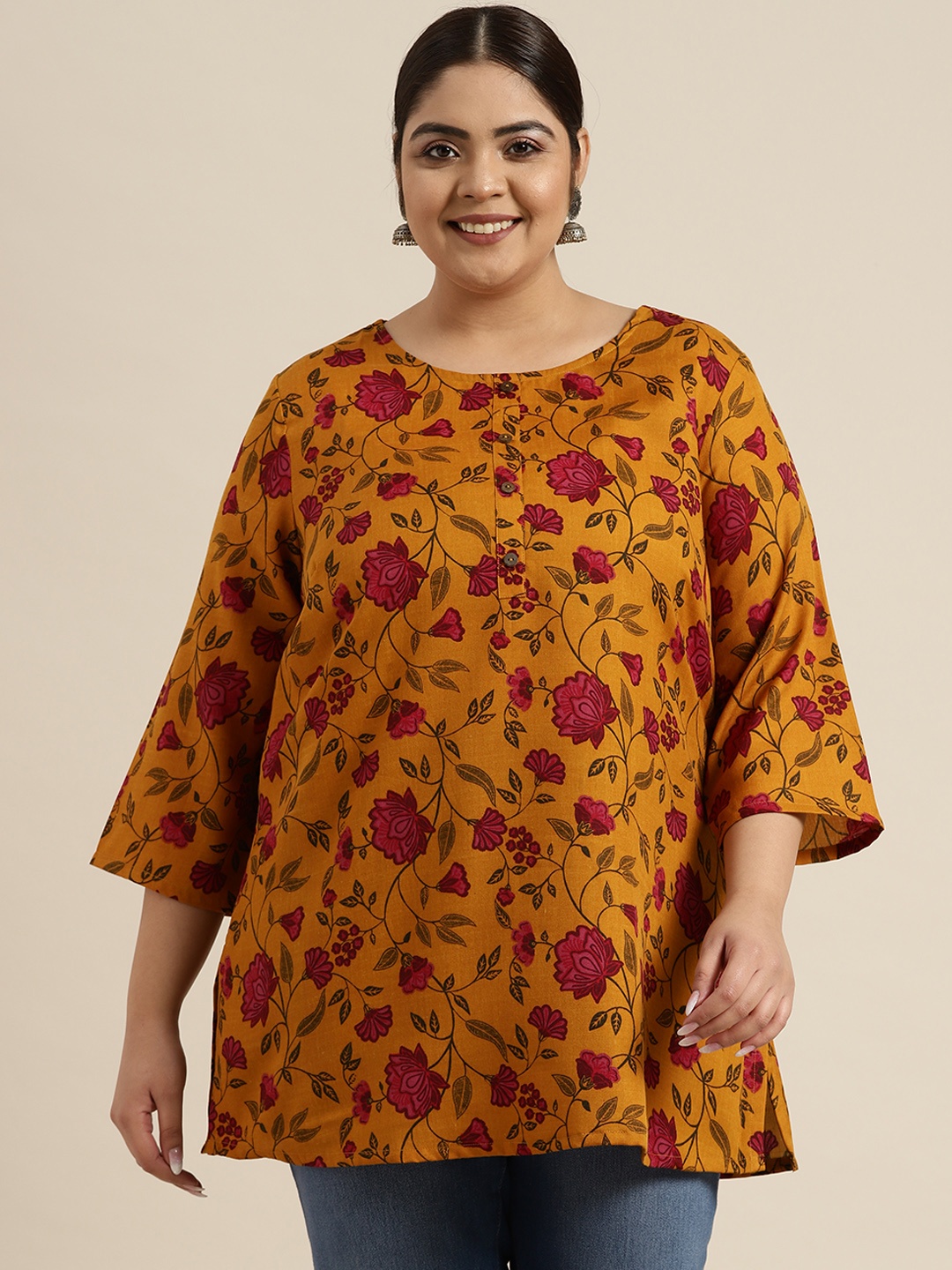 

Sztori Plus Size Mustard Yellow & Pink Ethnic Motifs Printed Kurti