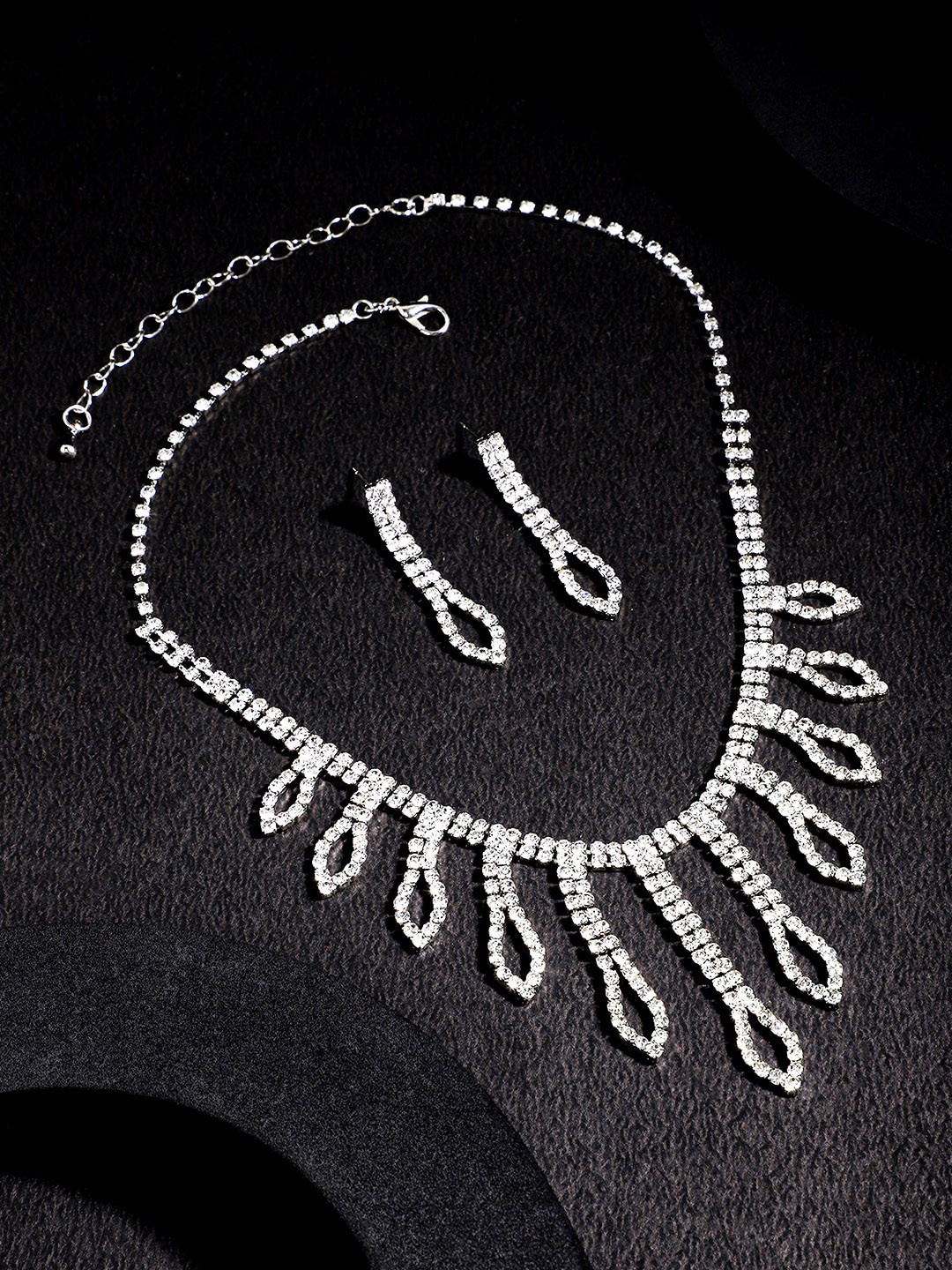

Yellow Chimes Silver-Plated White Crystal Studded Jewellery Set