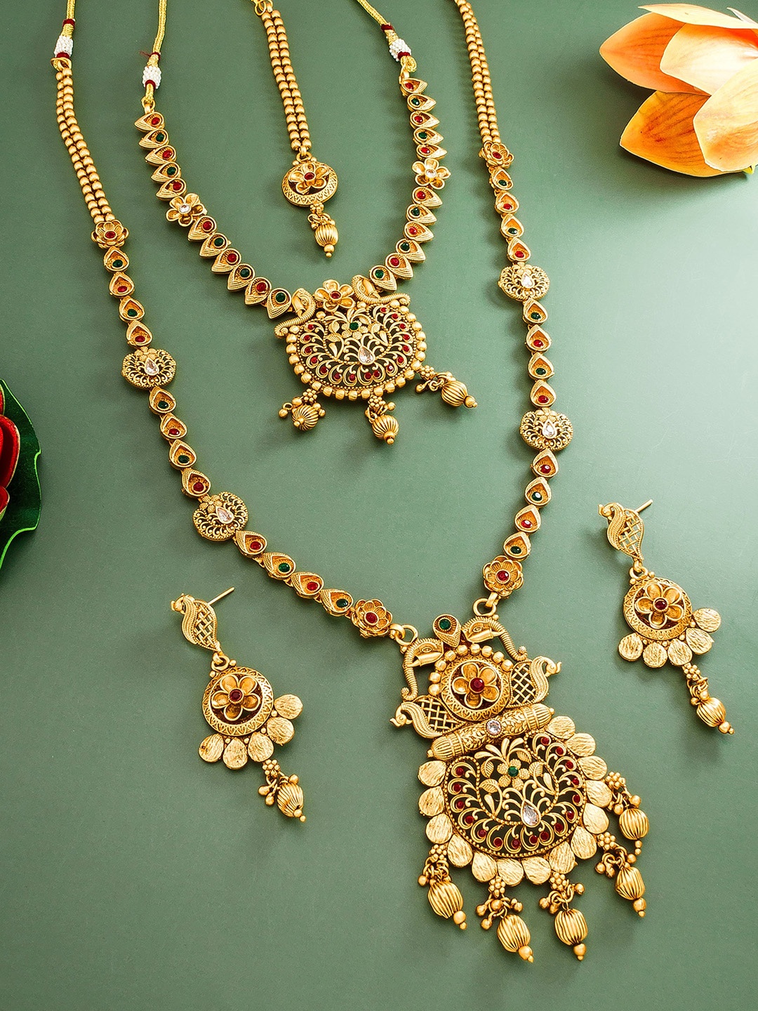 

aadita Gold Toned Combo Choker and Matinee Temple Jewellery Set