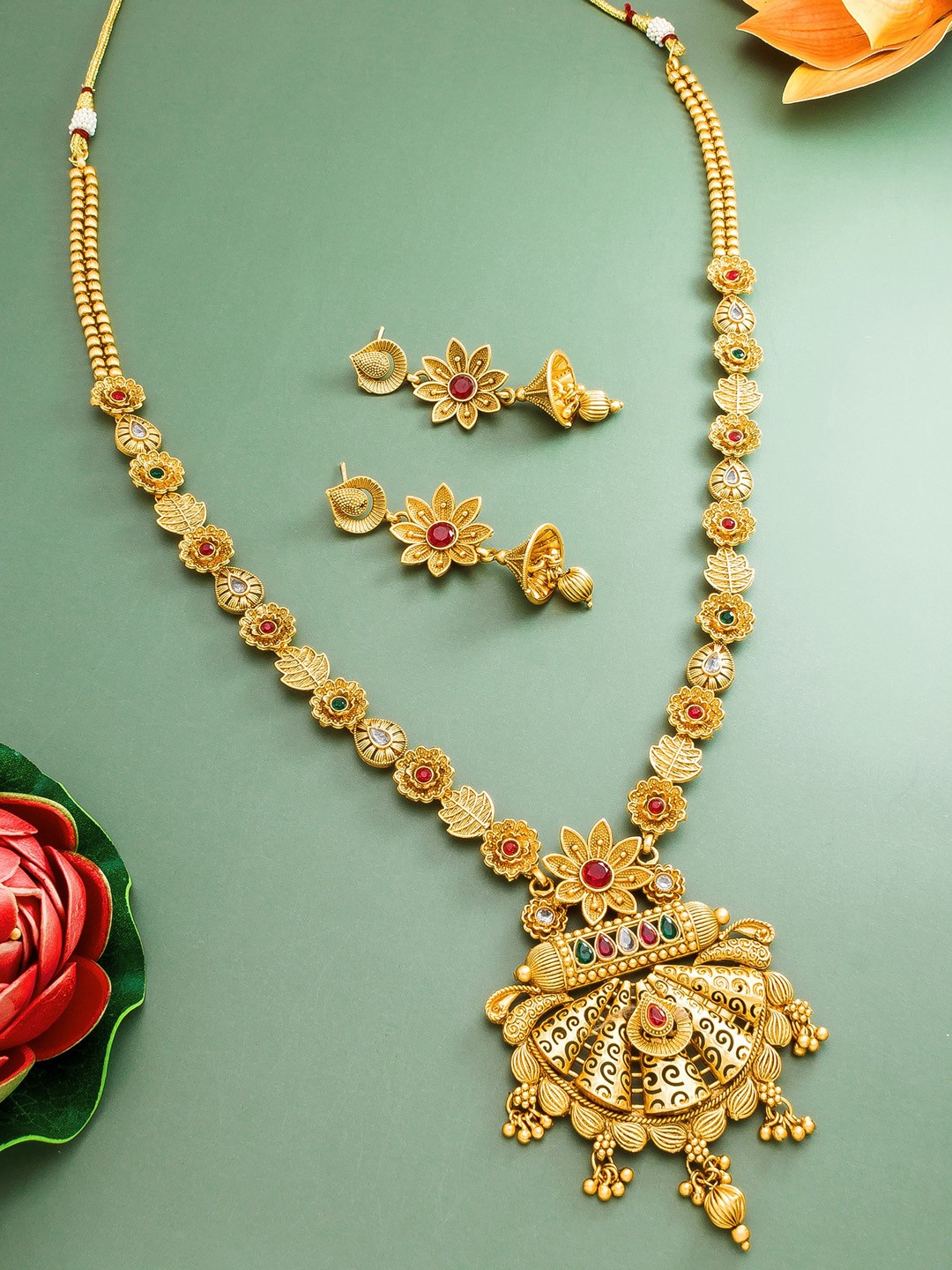 

aadita Gold Plated Studded Temple Jewellery Set