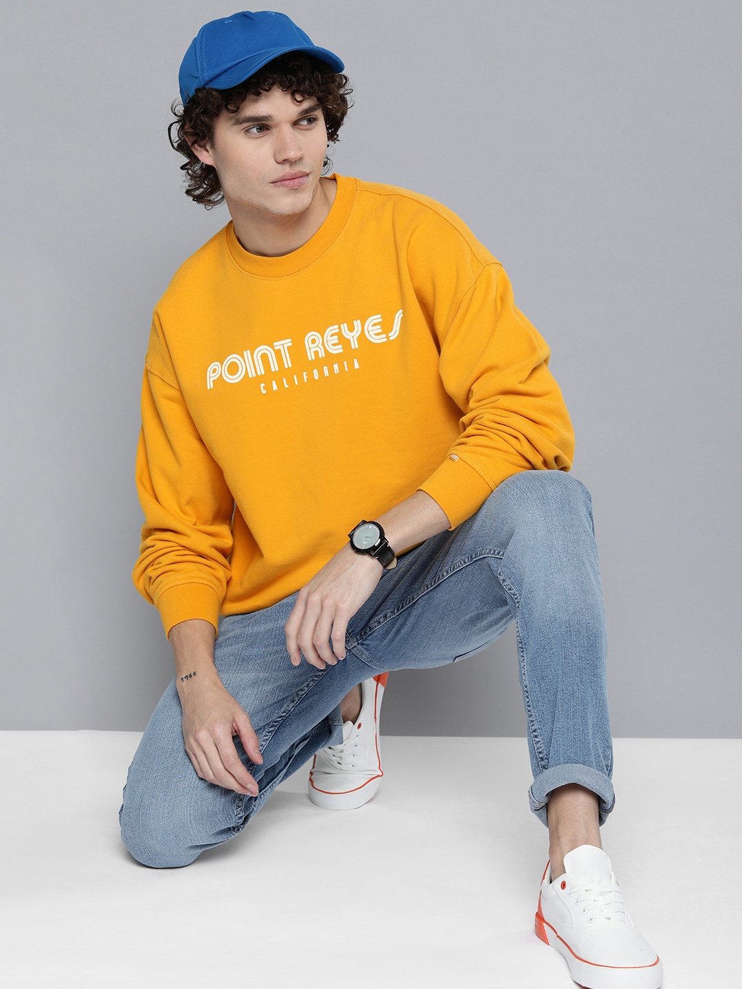 

Levis Men Typography Printed Round Neck Pure Cotton Sweatshirt, Mustard