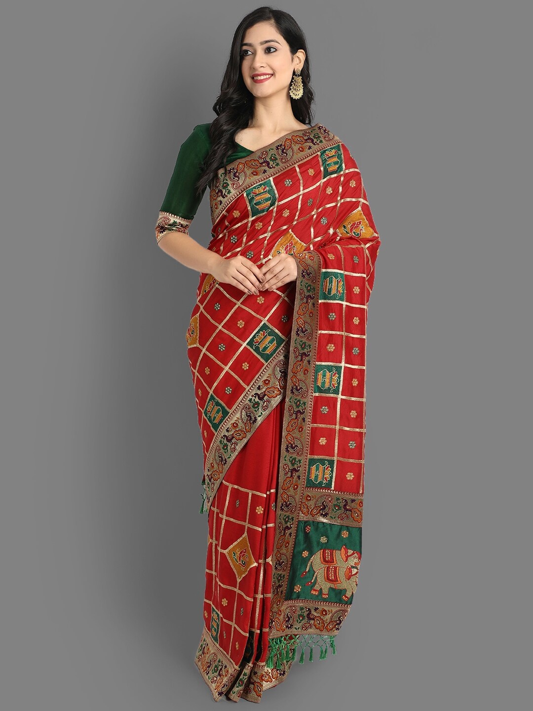 

Ekta Textiles Red & Green Ethnic Motifs Zari Silk Blend Patola Saree