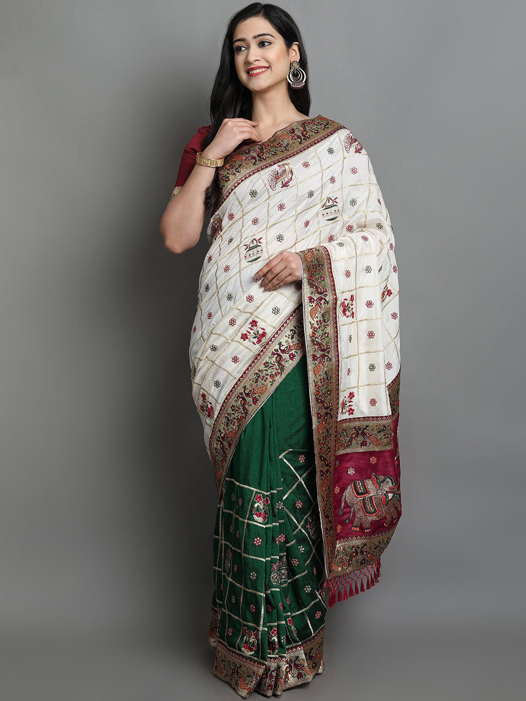 

Ekta Textiles White & Green Woven Design Zari Silk Blend Patola Saree