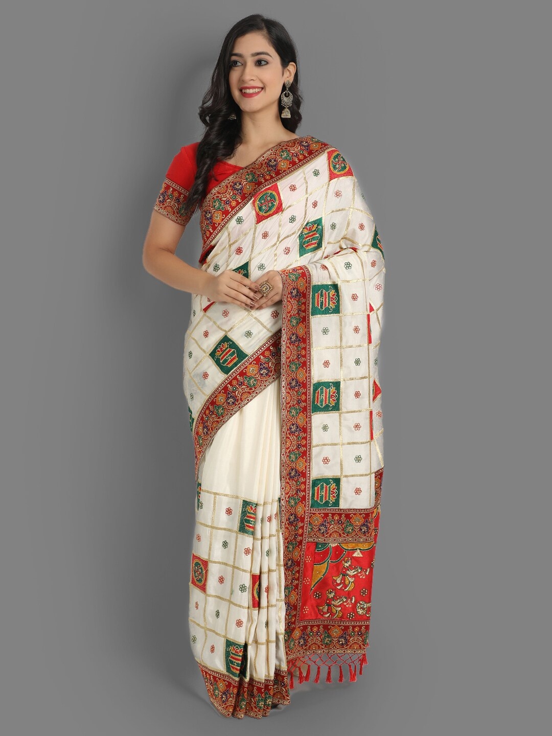 

Ekta Textiles White & Red Woven Design Zari Silk Blend Patola Saree