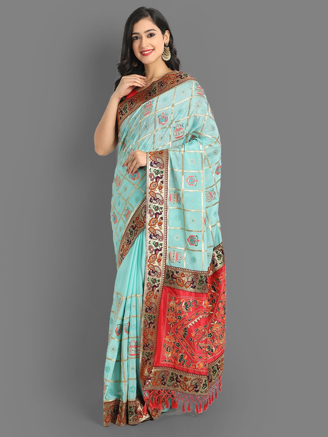 

Ekta Textiles Turquoise Blue & Pink Woven Design Embroidered Silk Blend Patola Saree