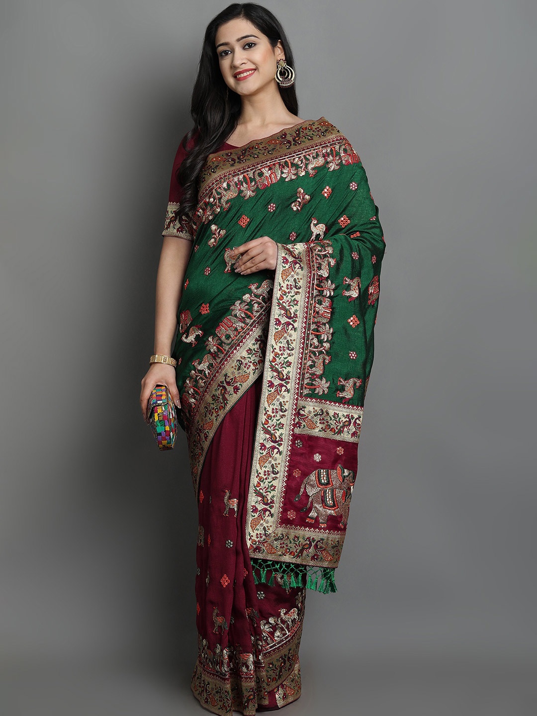 

Ekta Textiles Green & Maroon Woven Design Embroidered Silk Blend Half and Half Patola Saree