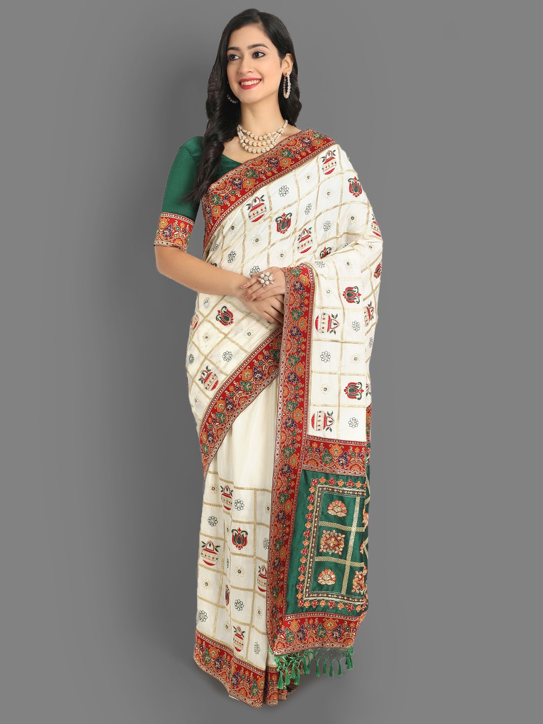 

Ekta Textiles Women White & Green Ethnic Motifs Zari Silk Blend Patola Saree