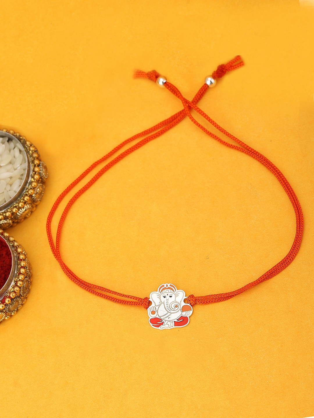 

Carlton London 925 Sterling Silver & Orange Lord Ganesh Rakhi