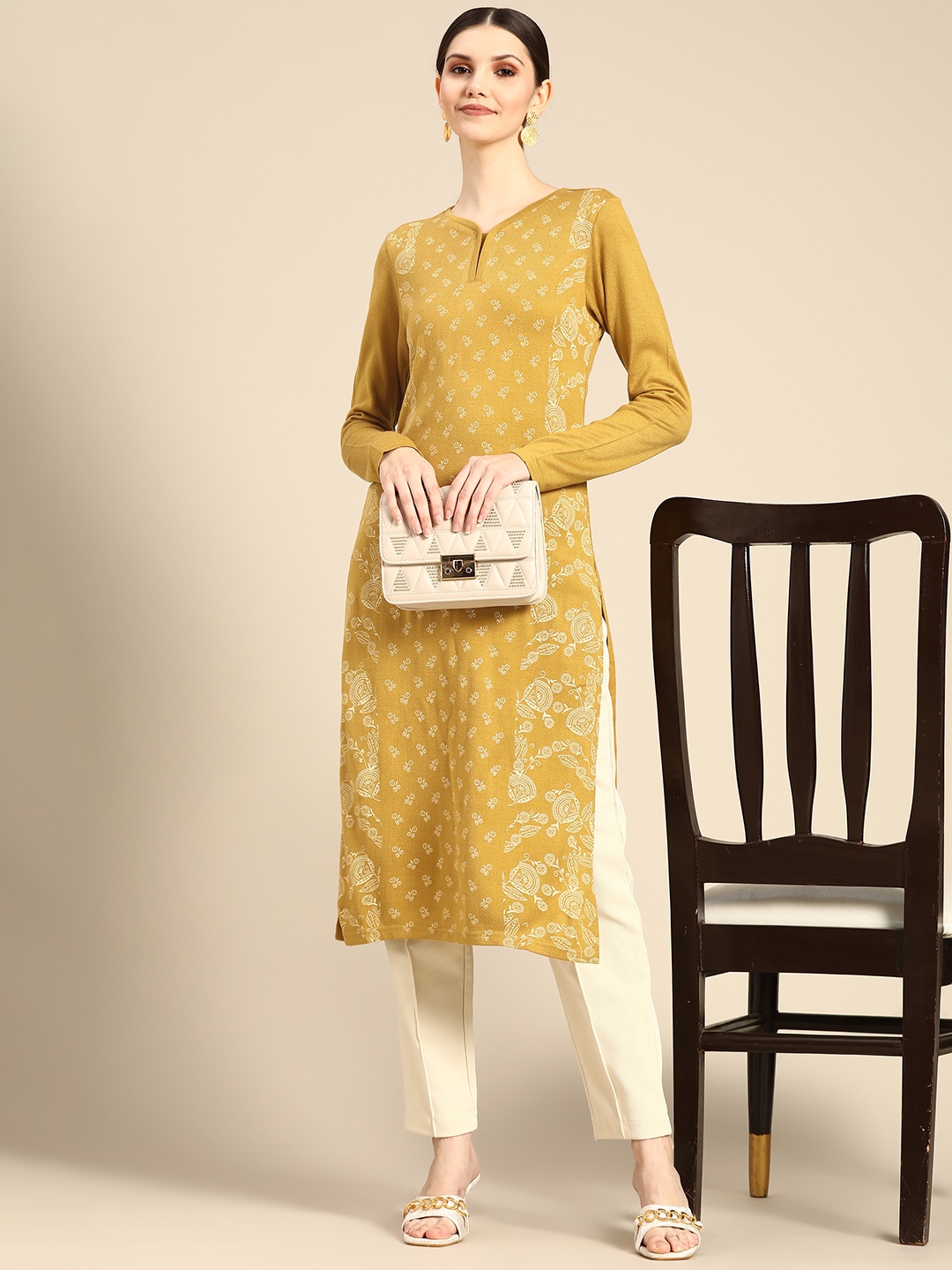 

Anouk Women Mustard Yellow & Off-White Ethnic Motifs Print Straight Woollen Kurta