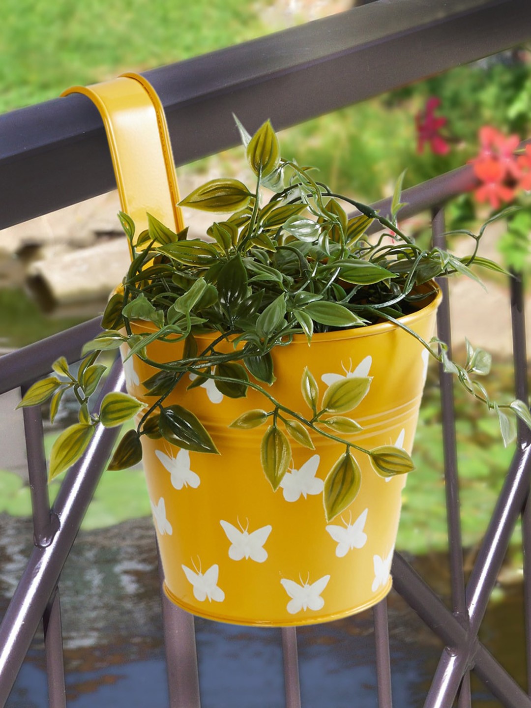 

Home Centre Yellow Corsica Eden Printed Butterfly Metal Hanging Planter