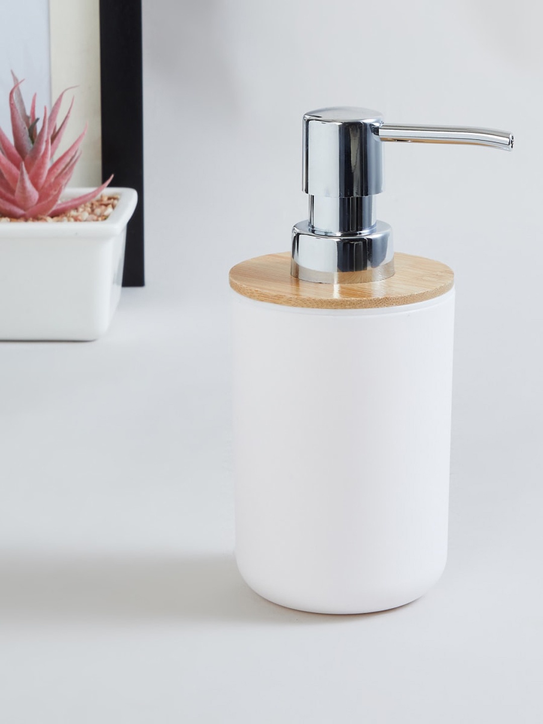 

Home Centre Orion Panache White Polypropylene Soap Dispenser - 420ml