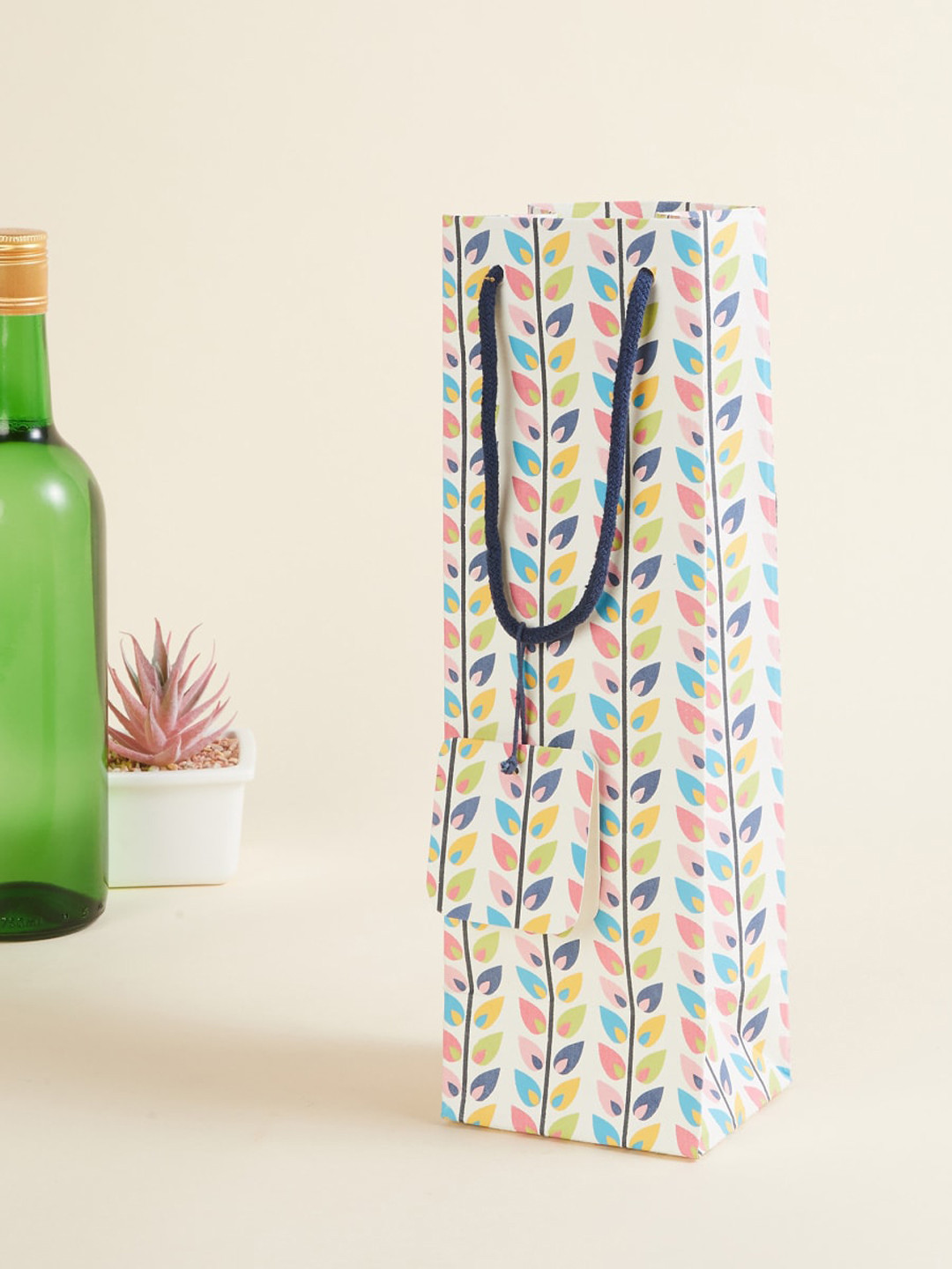 

Corsica Multicolor Printed Medium Paper Bag with Tag - 47x10x10cm, Multi