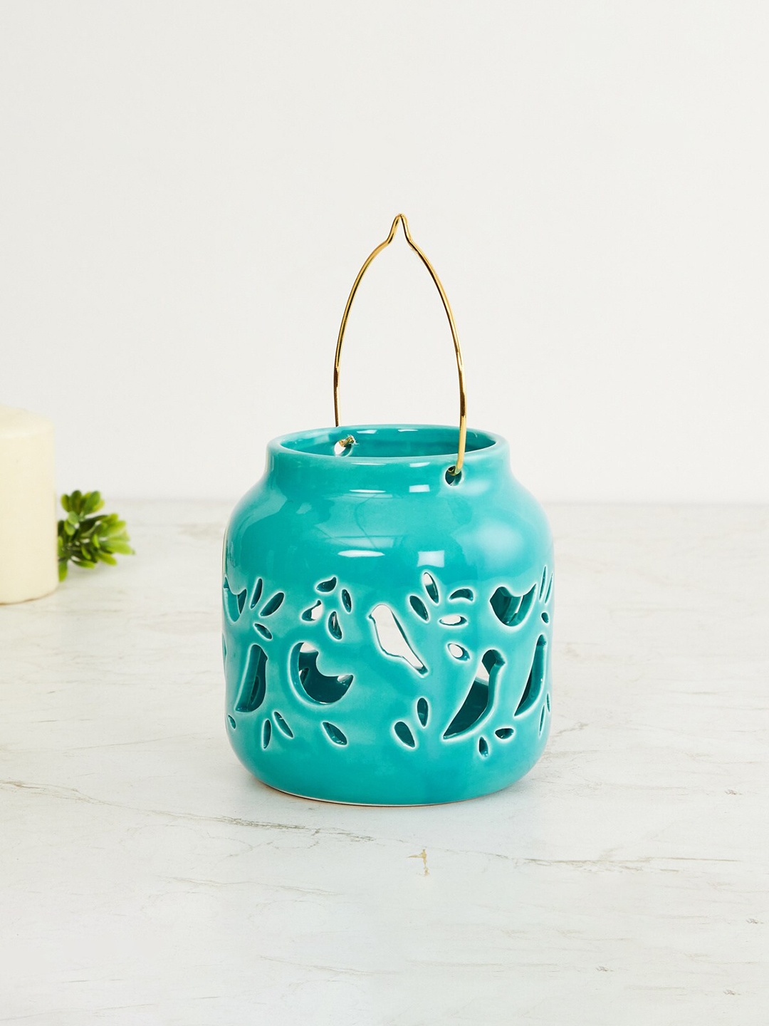 

Home Centre Teal Blue Heliost Bird Cutwork Lantern