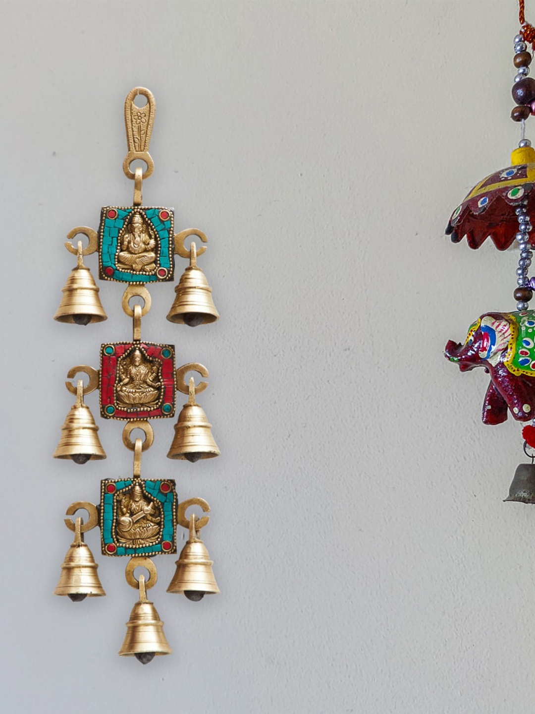 

Home Centre Gold Toned Corsica Mystic Tiered Bell Wall Hanging