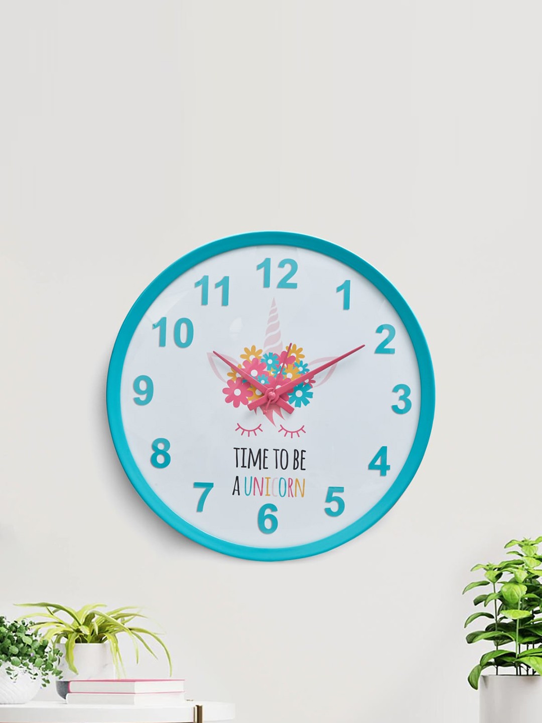 

Home Centre White & Blue Printed Contemporary 32 CM Analogue Wall Clock