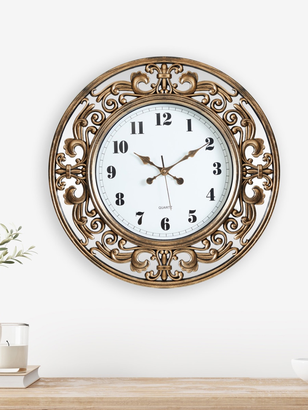 

Home Centre Black & Gold-Toned Embellished Traditional Wall Clock