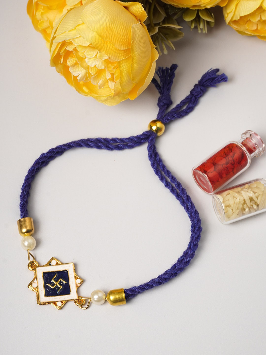 

Ferosh Blue Swastik Rakhi