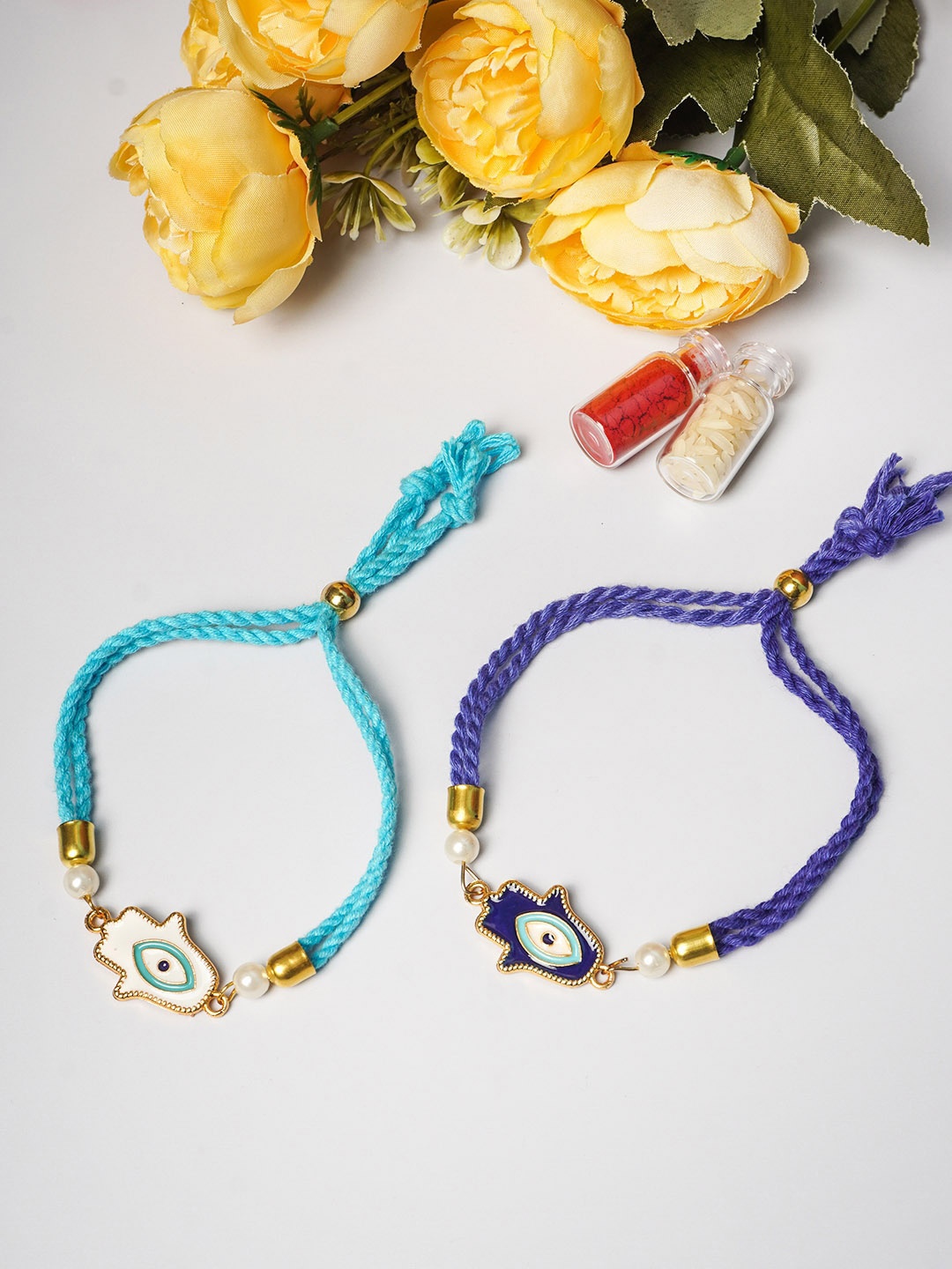 

Ferosh Set of 2 Blue & Navy Blue Hand Evil Eye Rakhi