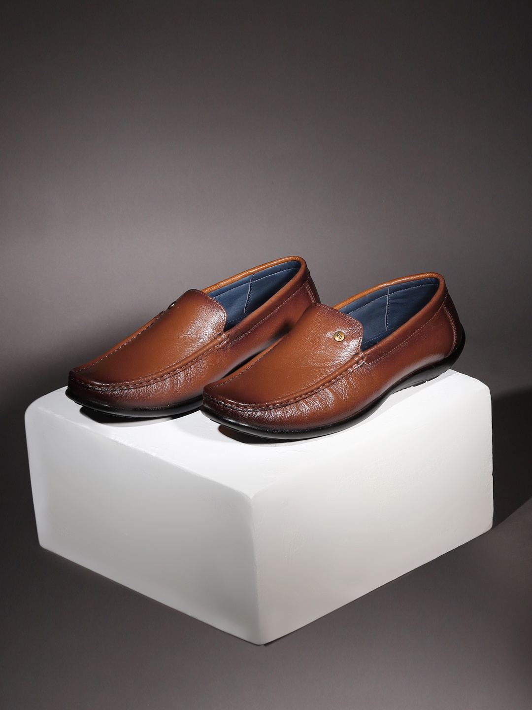 

Red Chief Men Tan-Brown Solid Leather Formal Loafers