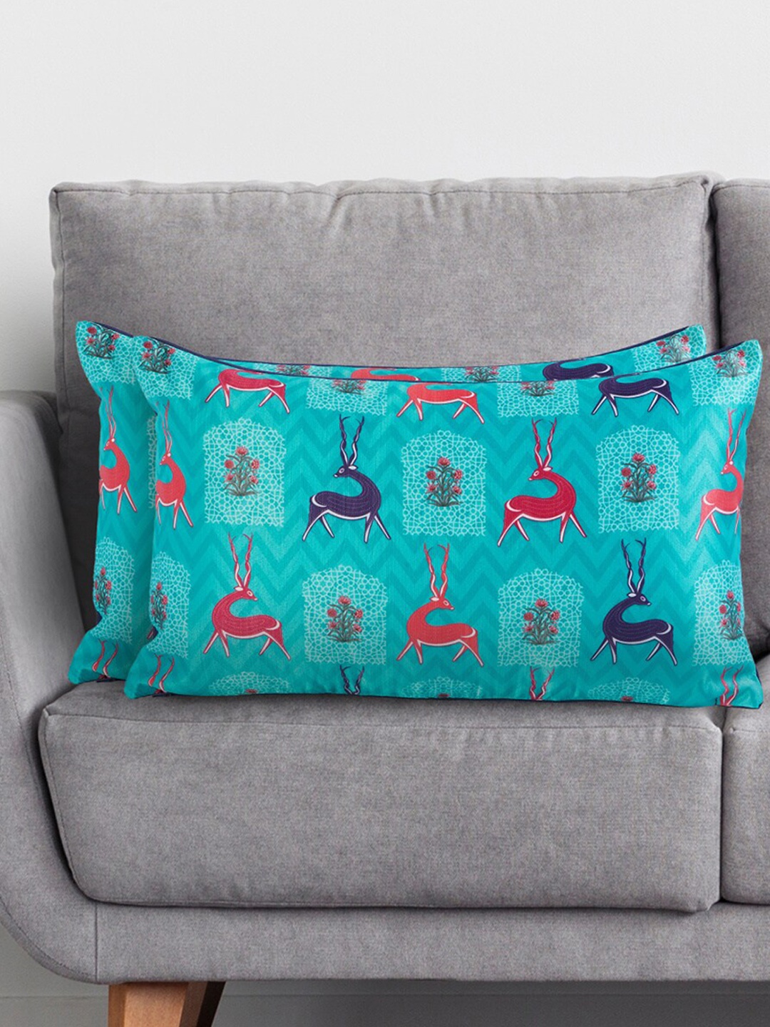 

Home Centre Teal & Red Set of 2 Animal Floral Printed Rectangle Cushion Covers