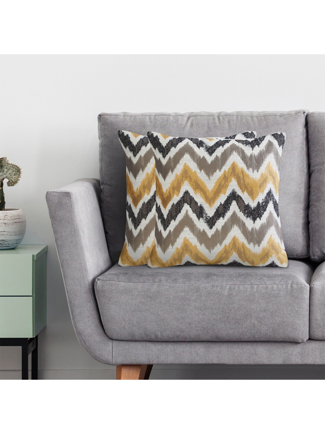 

Home Centre White & Brown Set of 2 Abstract Square Cushion Covers