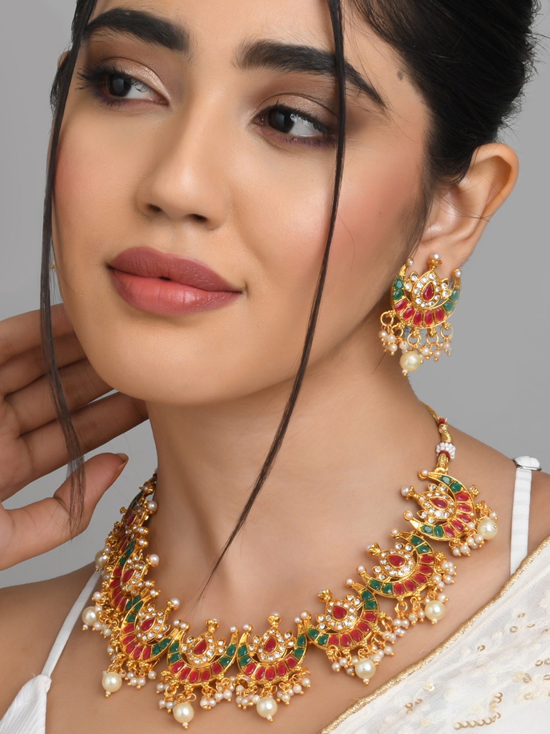 

Fida Red & Gold-Toned & Plated Kundan Studded Jewellery Set