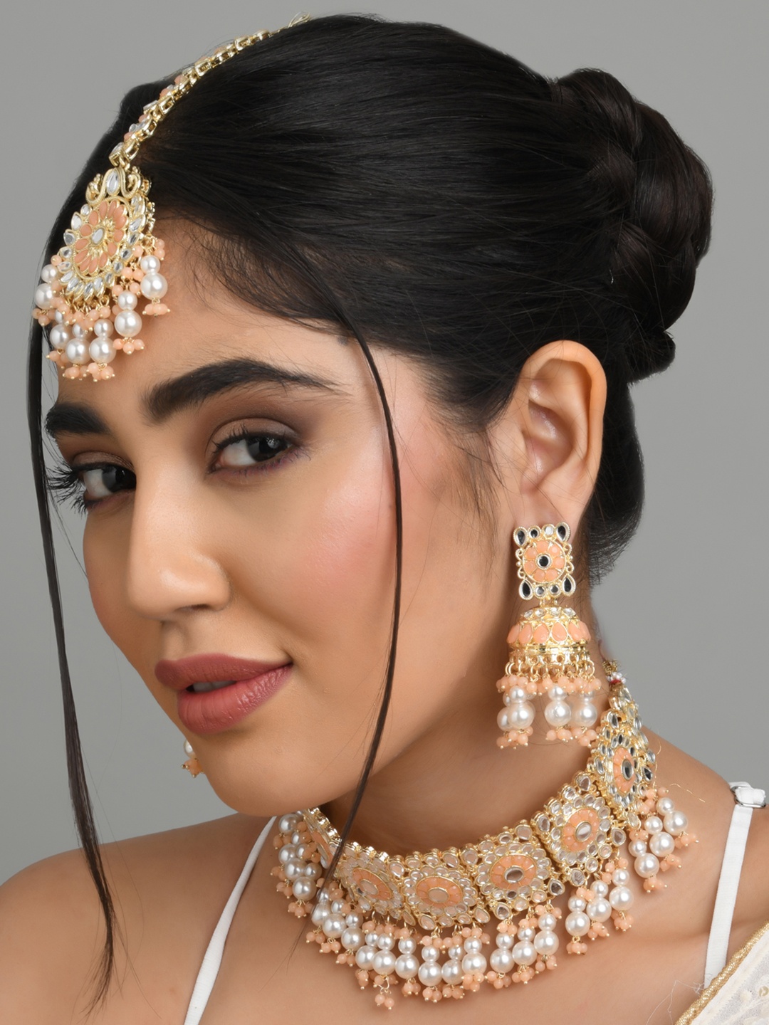 

Fida Women Peach-coloured & Gold-Toned Pearl Kundan Jewelry Set