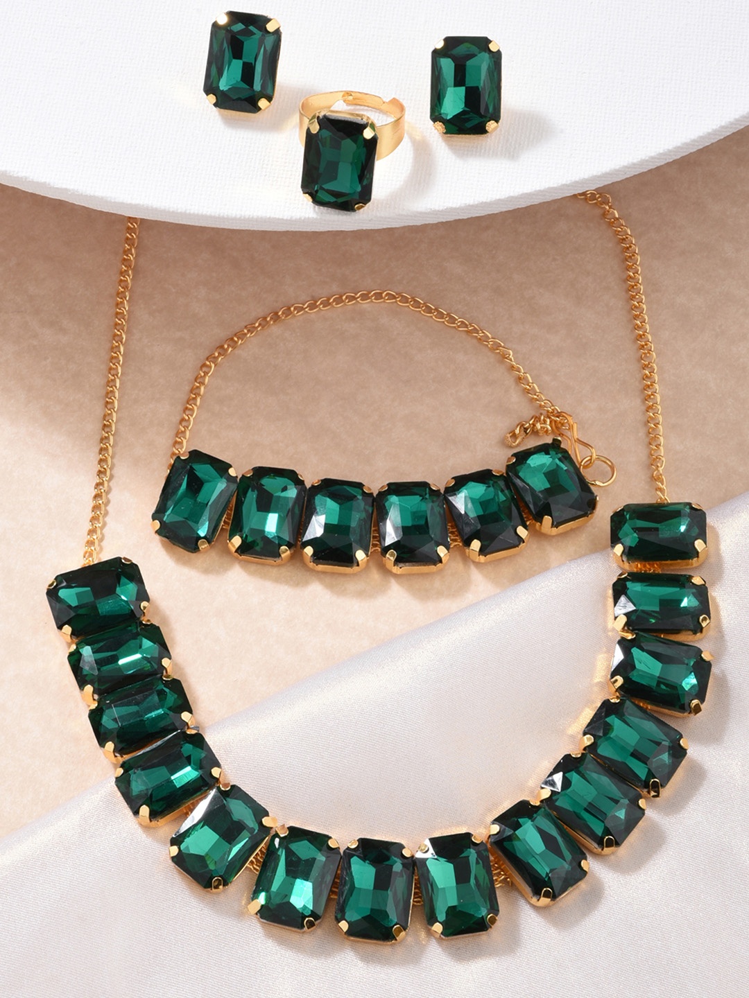 

Fida Green & Gold-Toned & Plated CZ Studded Jewellery Set