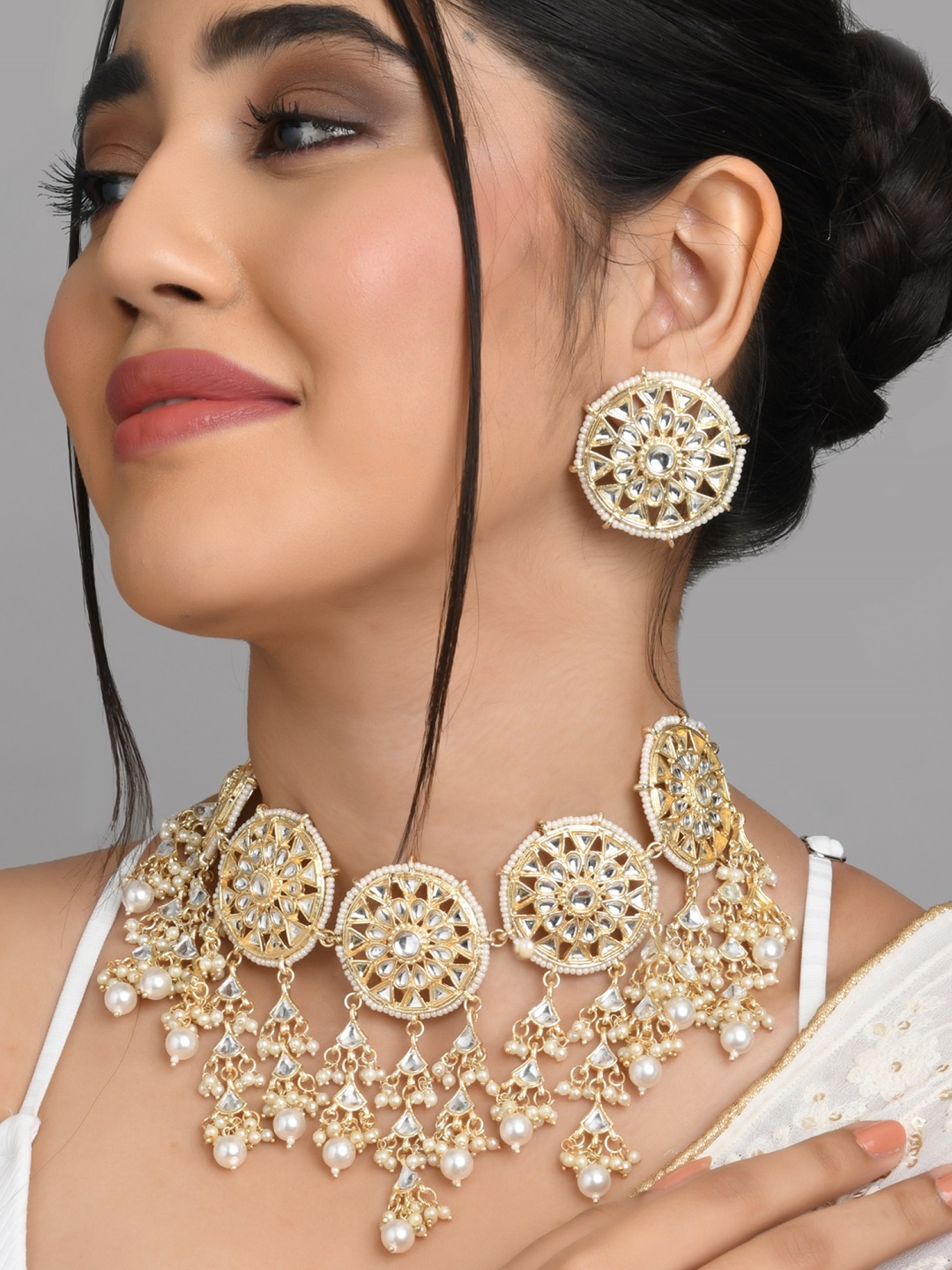 

Fida Gold-Plated White Kundan-Studded & Pearls Beaded Jewellery Set