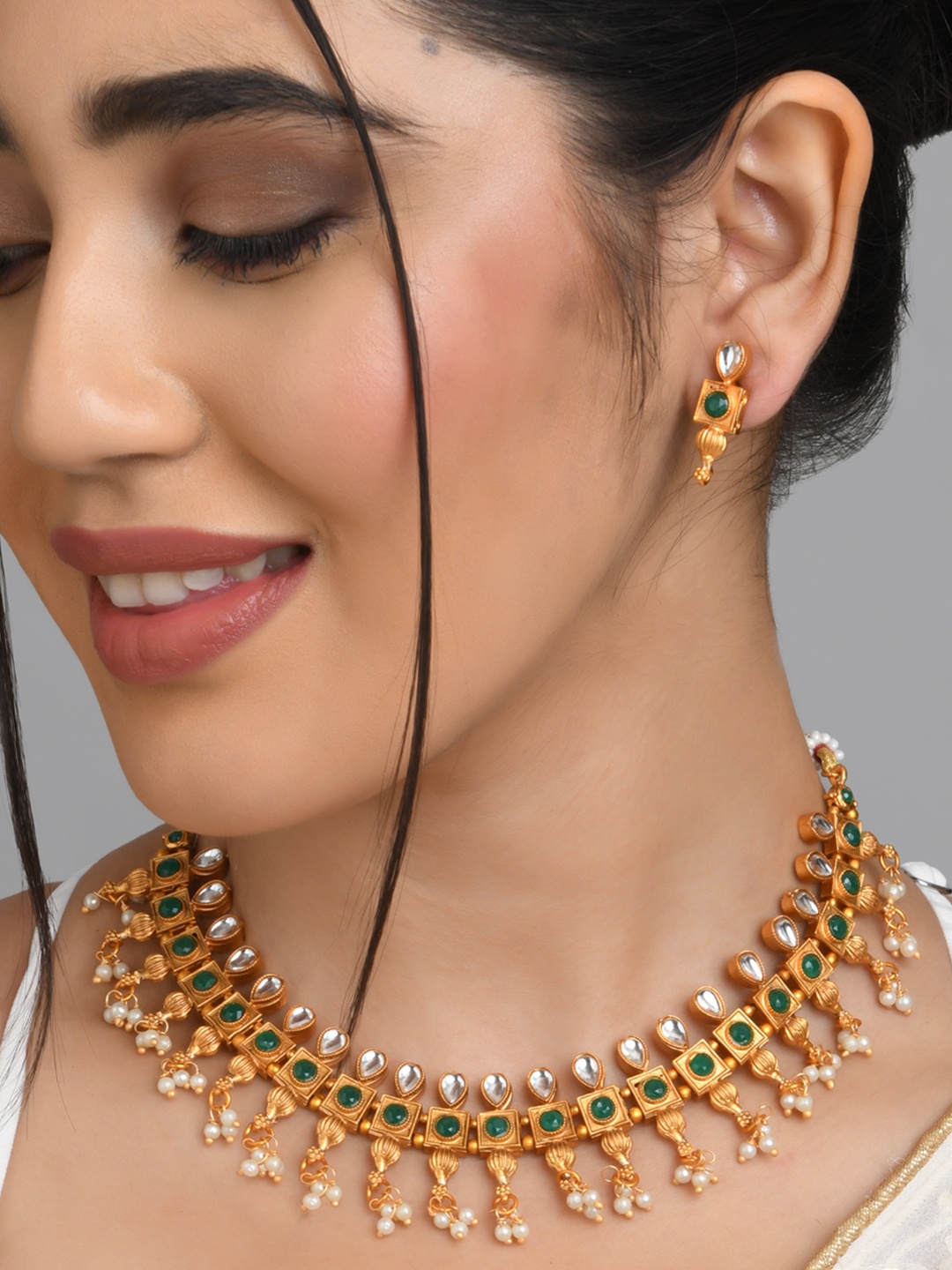 

Fida Women Gold-Plated Green Artificial Stones & Beads Studded Jewellery Set