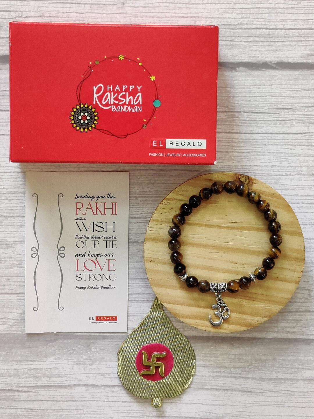 

EL REGALO Elasticated Om Charm Rakhi, Brown