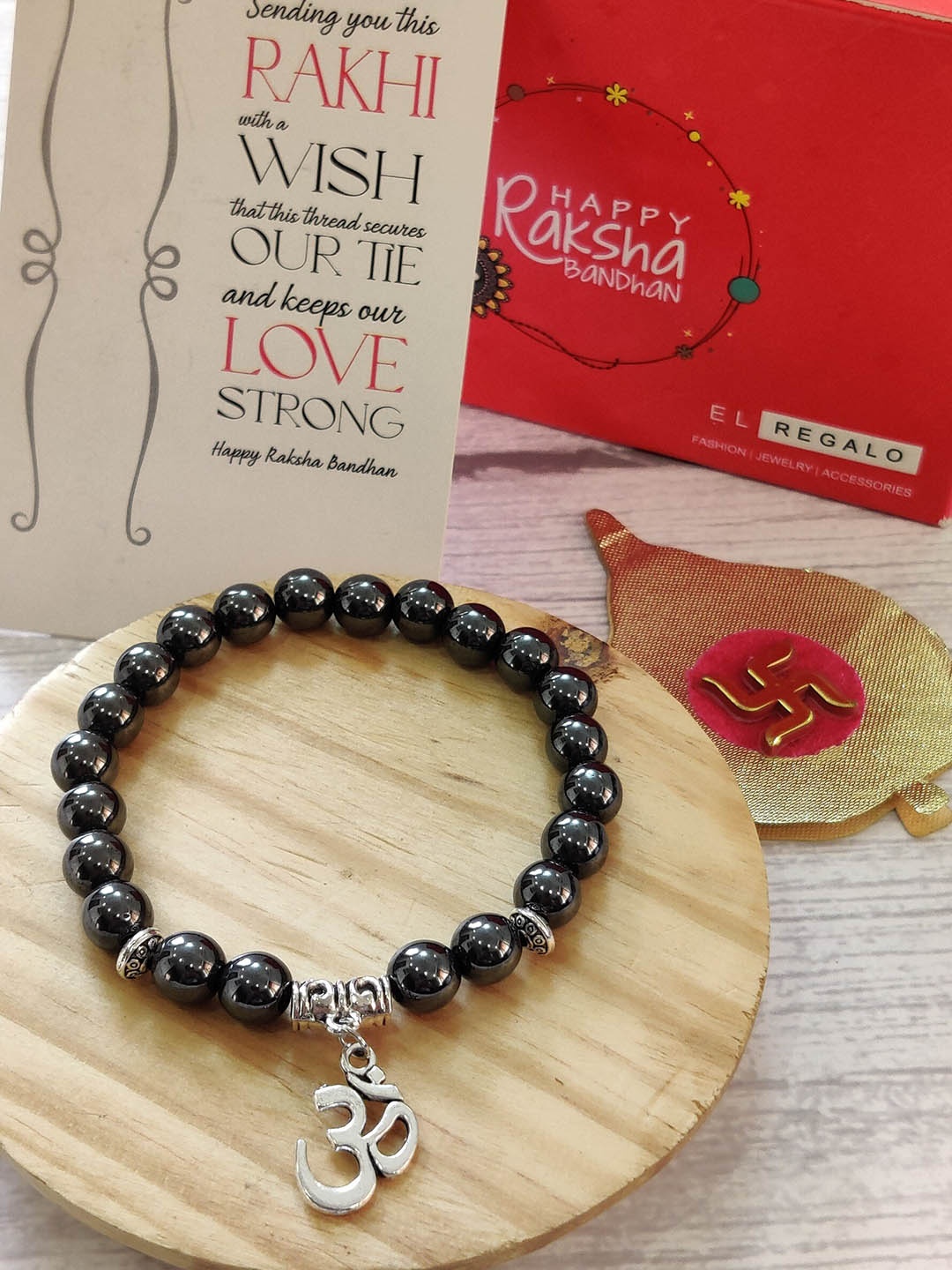 

EL REGALO Grey Om Bracelet Rakhi