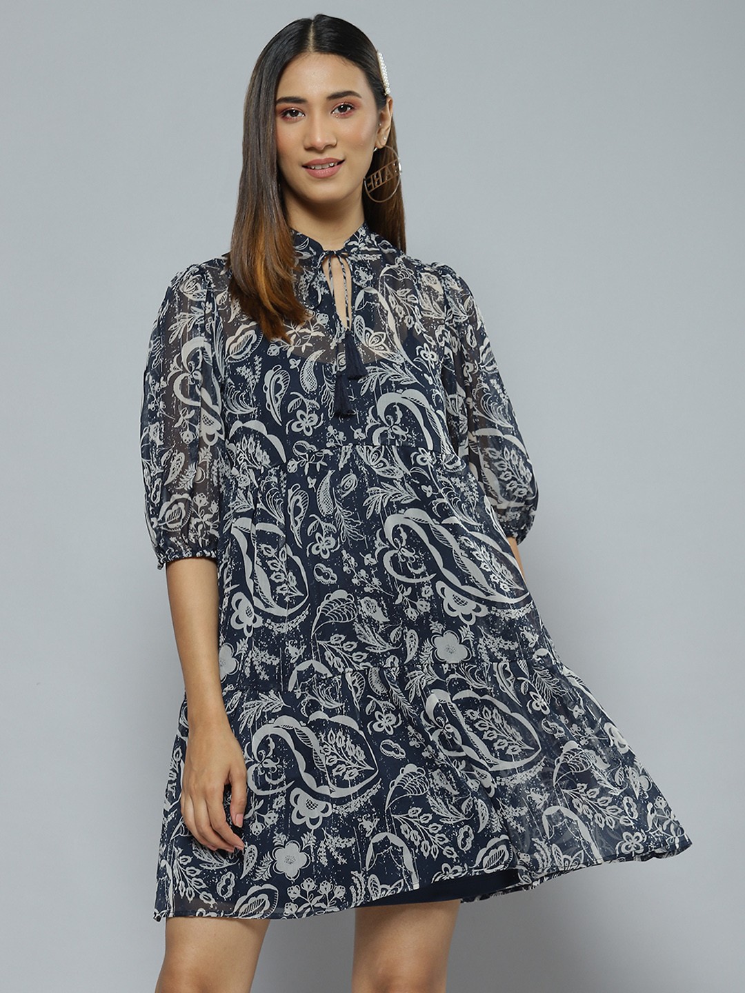 

Femella Navy Blue Paisley Tie-Up Neck Chiffon Mini Dress