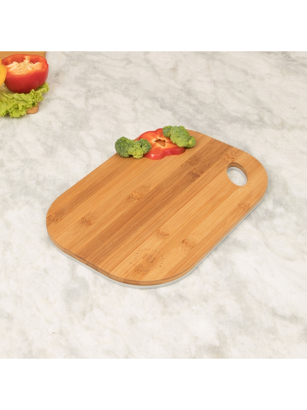 

Home Centre Truffles Edulis Brown Solid Bamboo Double Sided Cutting Board