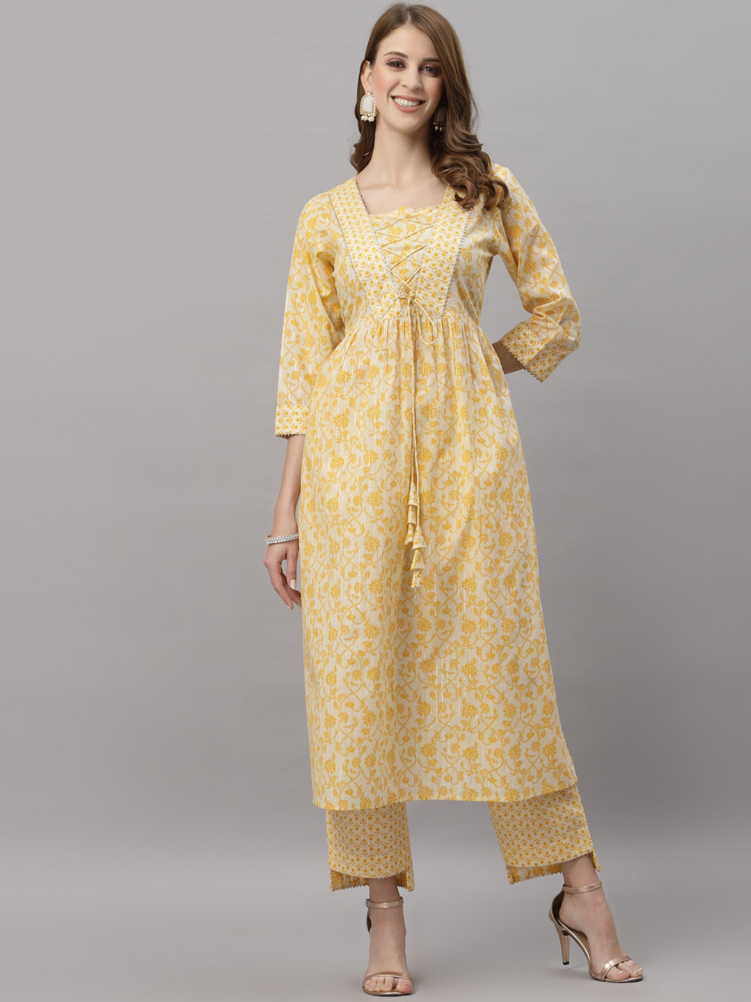 

Ragavi Women Yellow Floral Printed Pleated Pure Cotton Kurti with Trousers