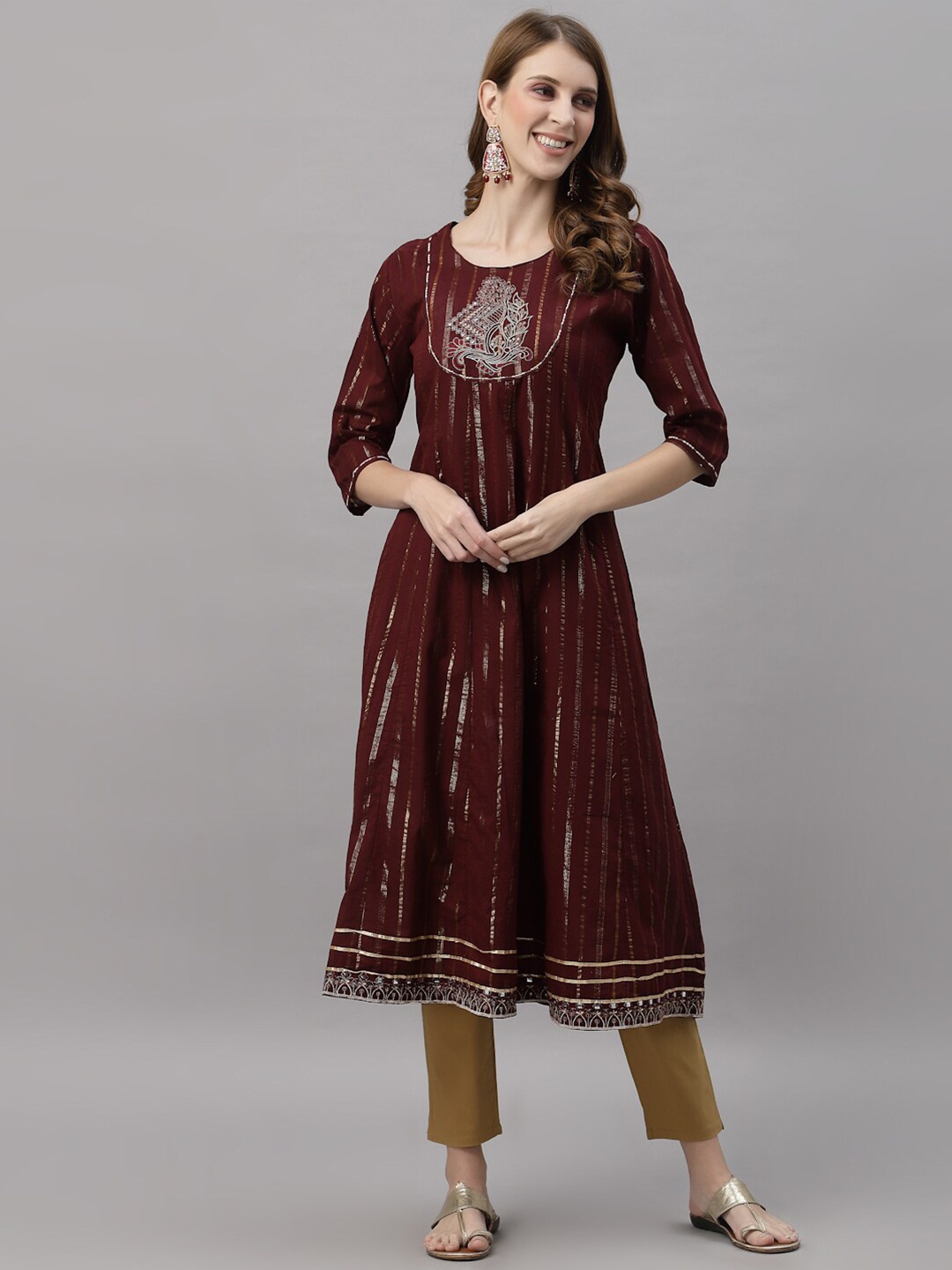 

Ragavi Women Maroon Geometric Embroidered A-Line Kurta