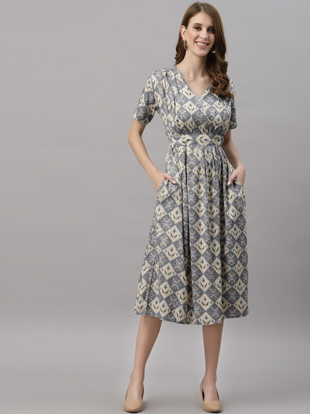 

Ragavi Blue & nirvana Women Ethnic Motifs Pleated Fit & Flare Dress