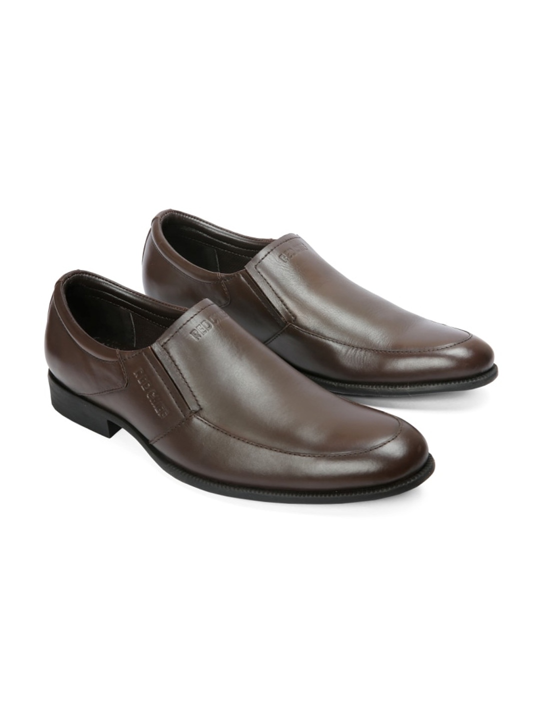 

Red Chief Men Brown Solid Leather Formal Slip On Shoes