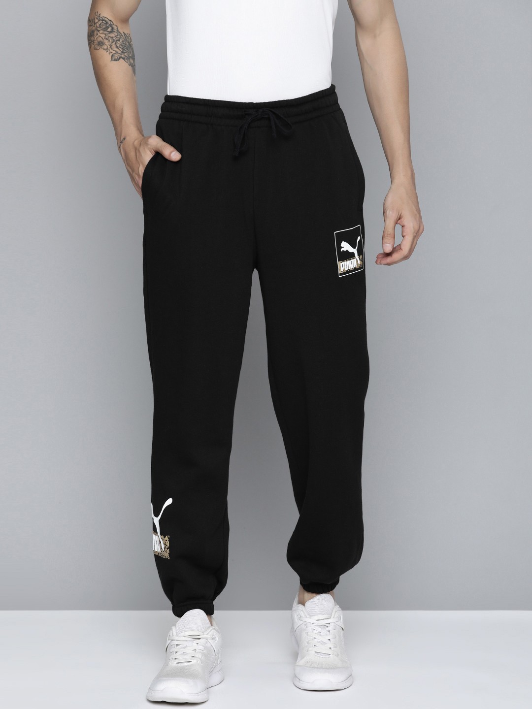 

Puma Men Black Printed Relaxed Fit Brand Love Joggers
