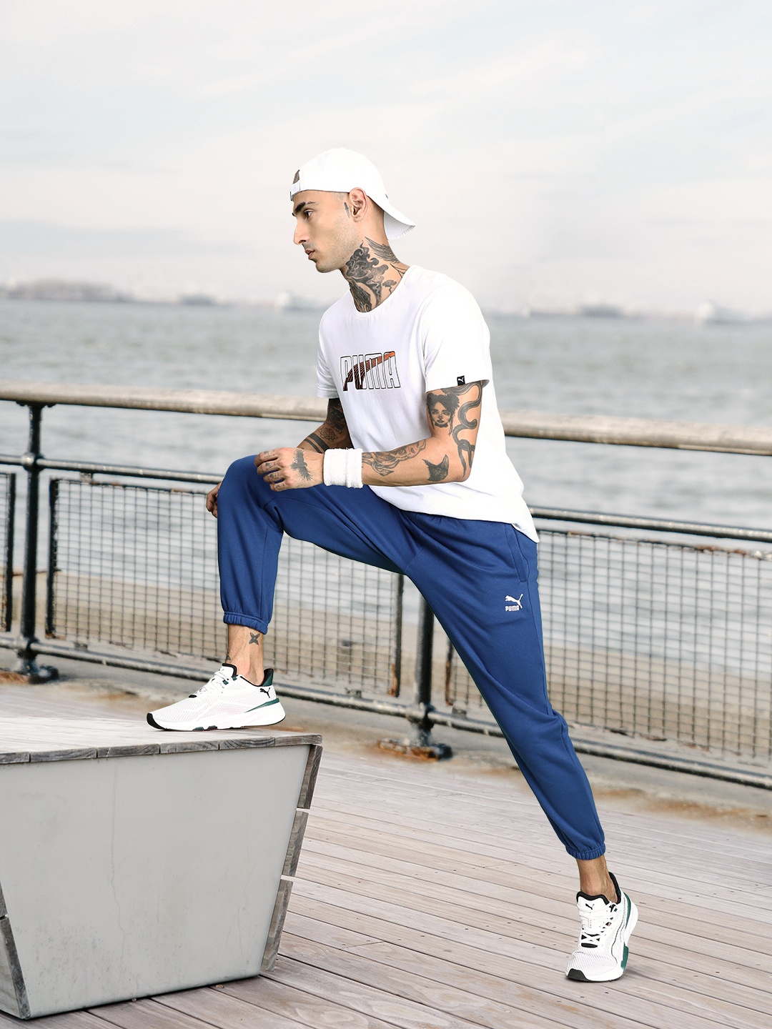 

Puma Men Blue Brand Logo Embroidered Mid-Rise Relaxed Fit Classics Joggers