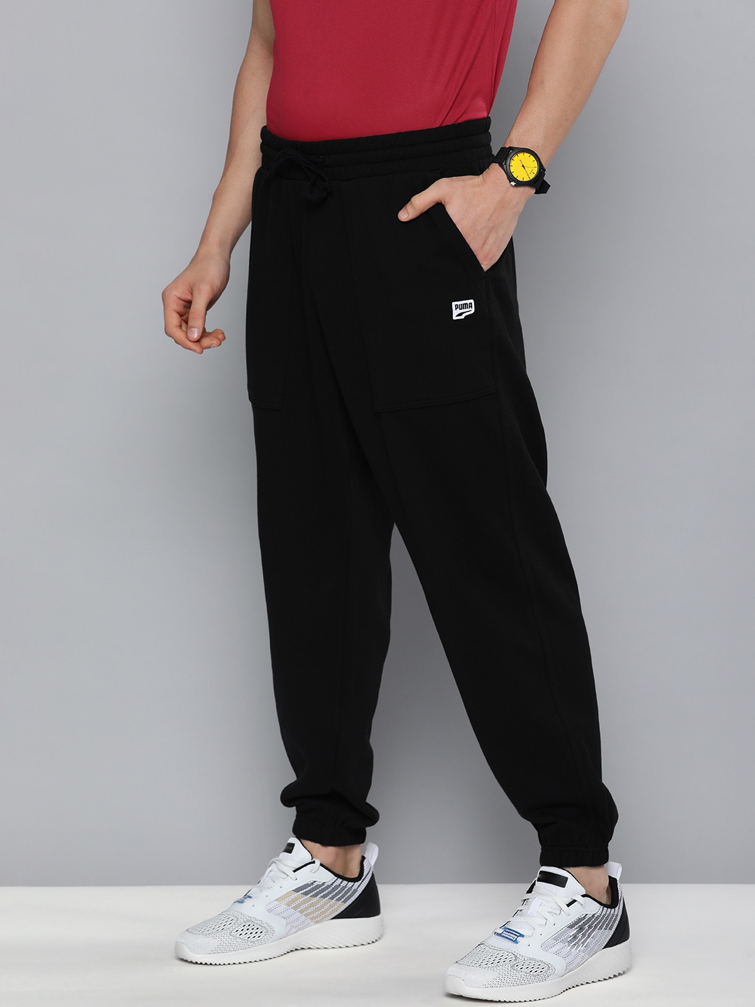 

Puma Men Relaxed Fit Solid Downtown Joggers, Black