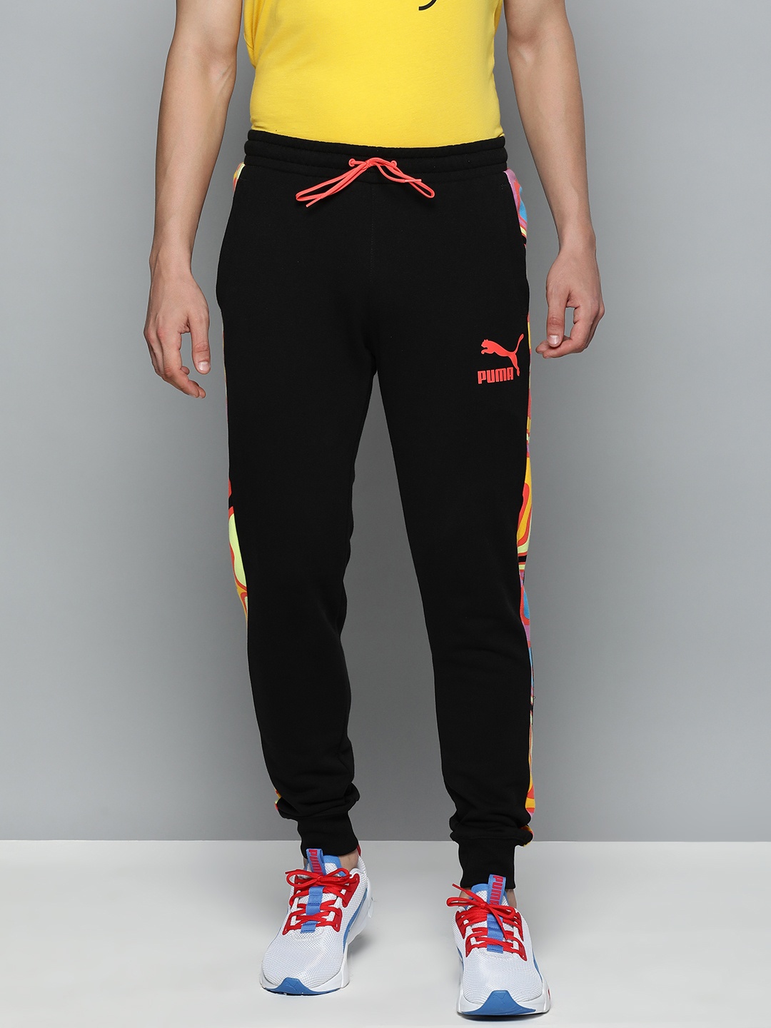 

Puma Men Black Lava Flow T7 Side Printed Joggers