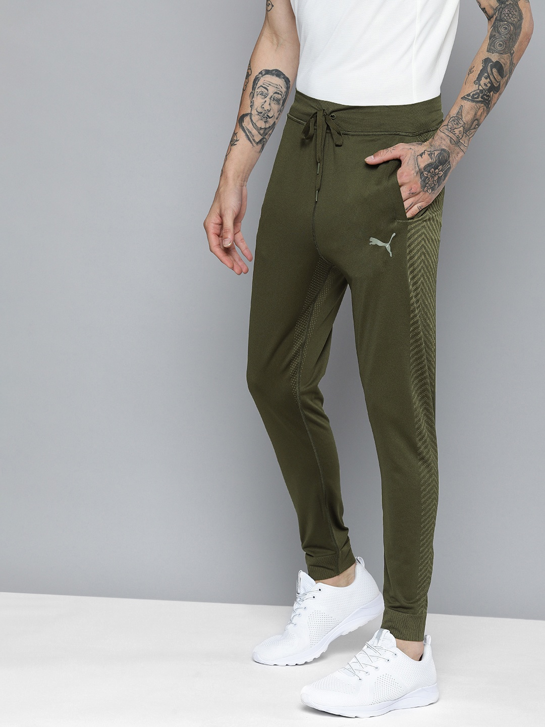 

Puma Men Olive Green Brand Logo Printed Slim Fit dryCELL Formknit Seamless Jogger