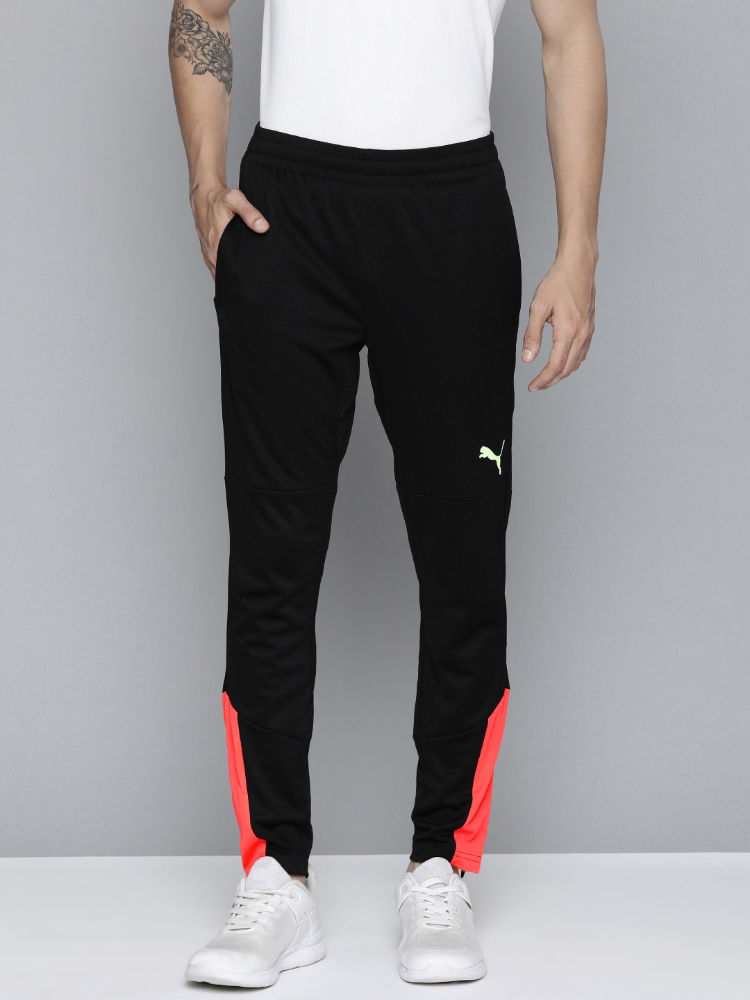 

Puma Men Black & Orange Colorblocked individual FINAL Training Track Pants